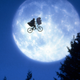ET flying across the moon.